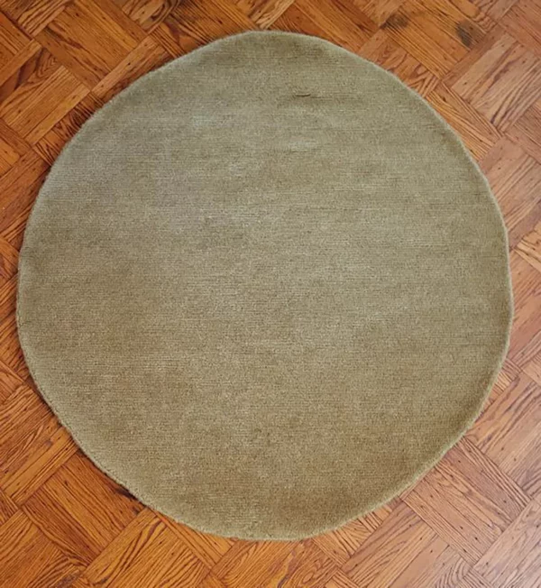 Small round wool rug
